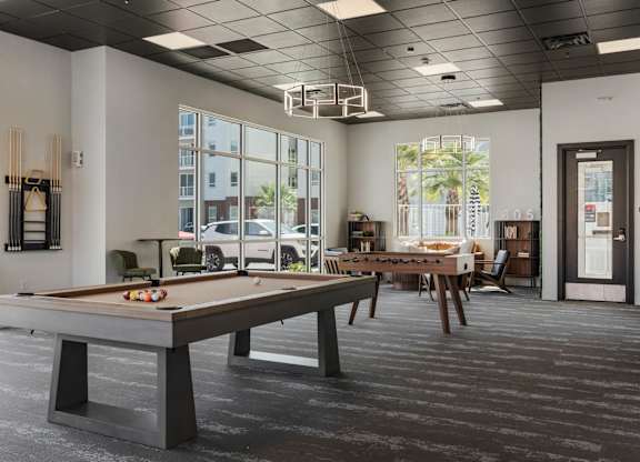 a clubhouse with a pool table and a ping pong table at 605 Place Student Housing & Co-Living, St George, UT, 84770