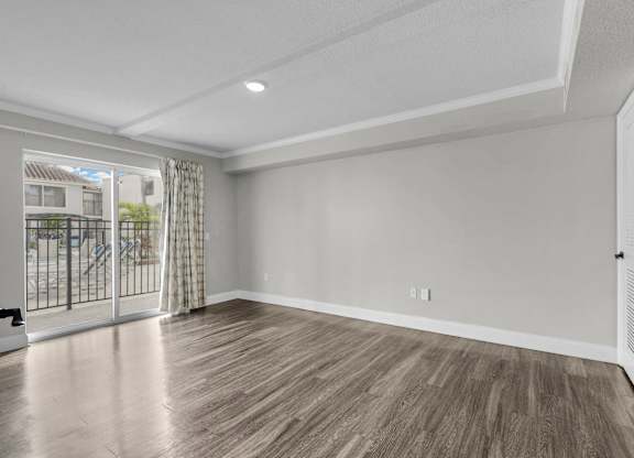 Room with attached balcony at Avia Apartments at Reedy Creek, Florida, 34747