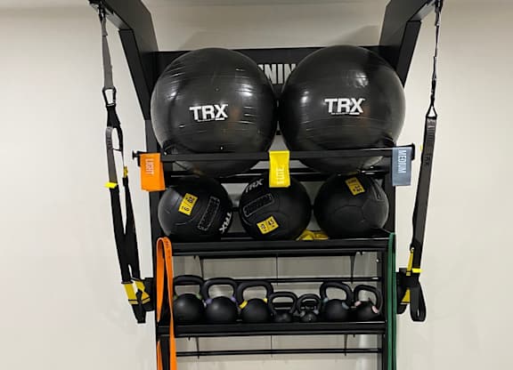 Gym with weights at Avia Lofts at Maple Road, Amherst