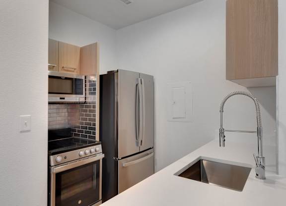 Kitchen Area at AVIA Apartments On Alpha, Dallas, TX
