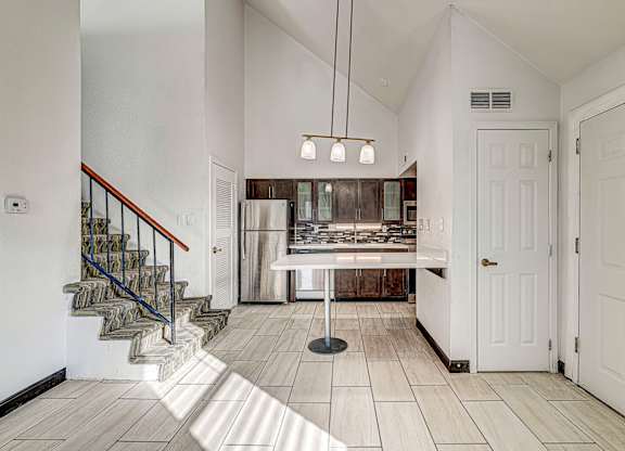 Kitchen with Tile Flooring at Avia Lofts at Founders Road, Indianapolis