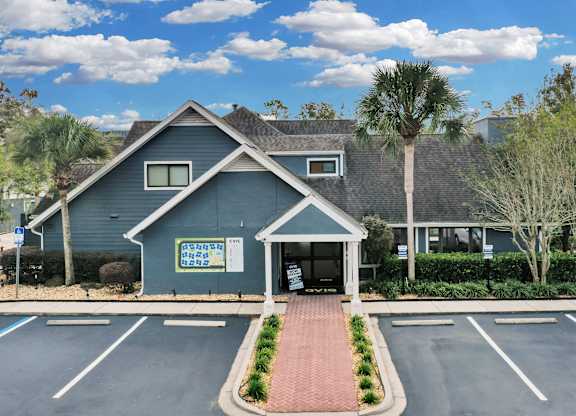 Parking lot front view at AVIA Lofts on Liberty Ridge, Apartments, Florida