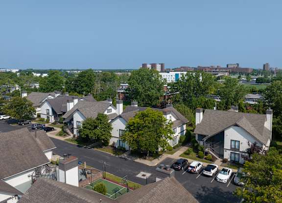 Residential area with houses and a basketball court at Avia Lofts at Maple Road, Amherst, NY, 14221