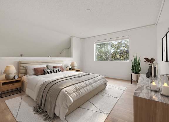 A well-lit bedroom at AVIA Lofts on Parkway, Vancouver, Washington