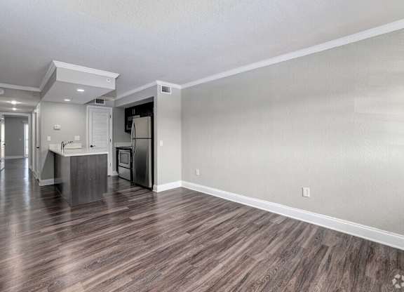 Empty Living Room at Avia Apartments at Reedy Creek, Kissimmee, FL