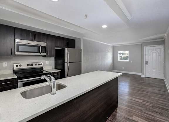 Interior kitchen view at Avia Apartments at Reedy Creek, Kissimmee, Florida
