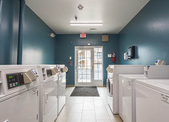 Community laundry room at AVIA Lofts on Victors Way, Michigan , 48108