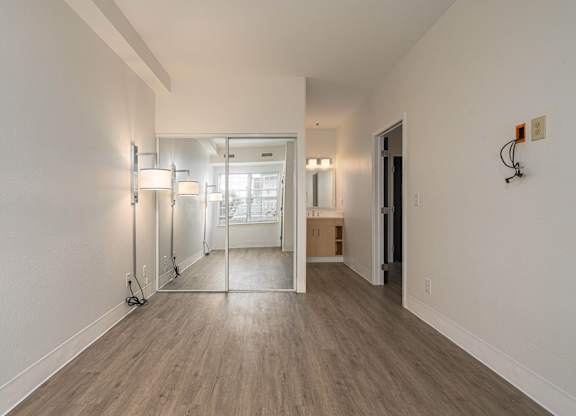 floor-to-ceiling mirrored sliding doors at AVIA Lofts on Victors Way, Michigan , 48108