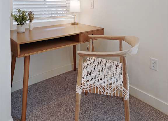 Room with chair and desk at Solhavn Apartments, American Fork, UT