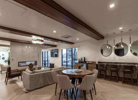 clubhouse with couch at The Flats at Riverwoods, Provo