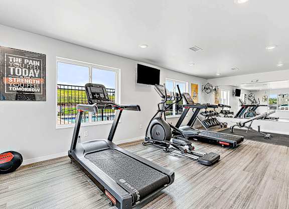 a workout room with treadmills and other exercise equipment at Red Rock Apartments, Rapid City, SD, 57702