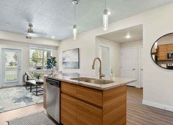 the enclave at homecoming terra vista kitchen and living room at The Flats at Riverwoods, Utah