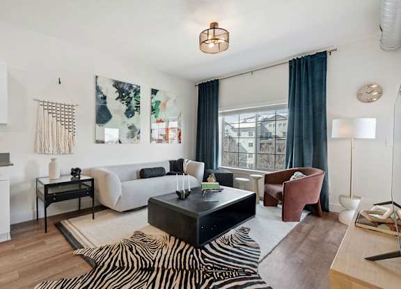 a living room with a couch and a coffee table at The Revival, Salt Lake City Utah