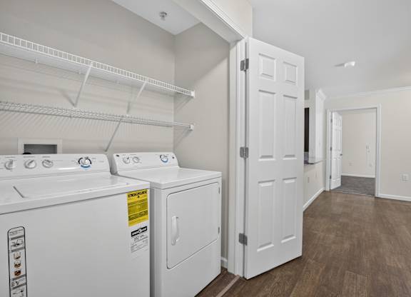 A laundry room with a washer and dryer.