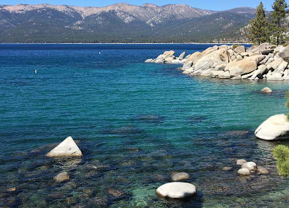Crystal clear lake with mountain views at Lakeside Manor Apartments, Nevada, 89509