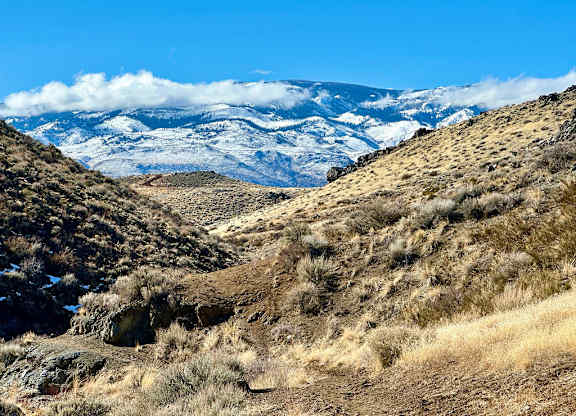 Snow capped mountains and desert landscape at Lakeside Manor Apartments, Nevada