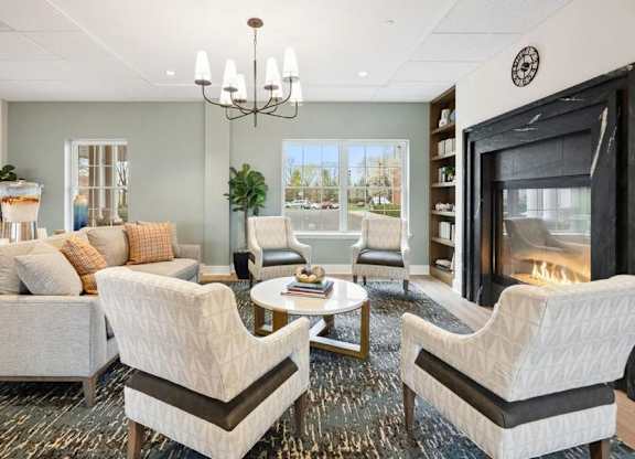 A living room with a fireplace and a couch.