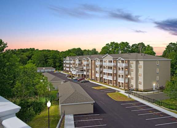 Aerial view of apartment complex at twilight at Glenmont Abbey Village, 55+ Apartments, New Jersey, 12077