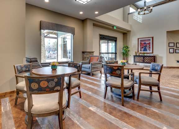Community dining area with round tables at Mountain Lakes Estates Apartments, Reno, NV 89521
