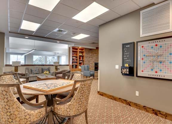 Activity room with scrabble board and gaming table at Mountain Lakes Estates Apartments, Reno, 89521