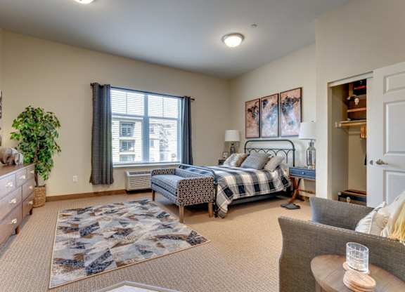 Studio apartment with bedroom and seating area at Mountain Lakes Estates Apartments, Nevada, 89521