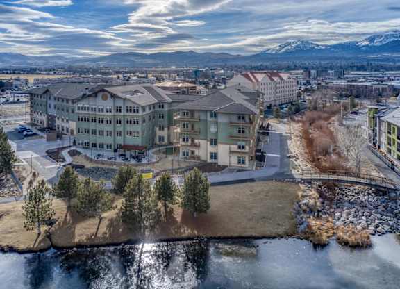 Winter aerial view of apartment complex with mountains at Mountain Lakes Estates Apartments, Nevada