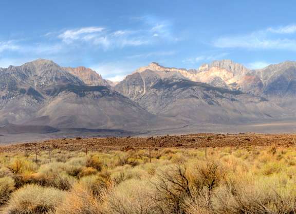 Desert landscape with range backdrop at Mountain Lakes Estates Apartments, Reno, 89521