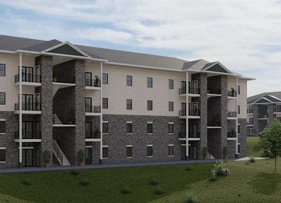 A large apartment complex with multiple balconies and doors.
