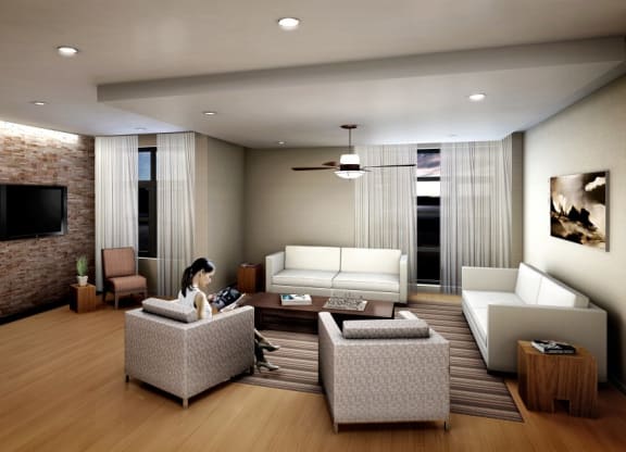 a living room filled with furniture and a fireplace  at The Sheffield Englewood, Englewood, 07631