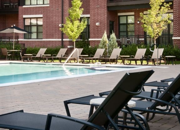 Courtyard and pool deck at The Sheffield at Englewood Apartments in Englewood, NJ