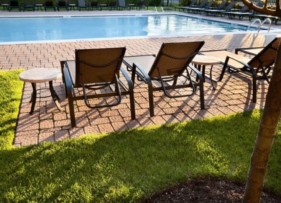 Courtyard and pool deck at The Sheffield at Englewood Apartments in Englewood, NJ