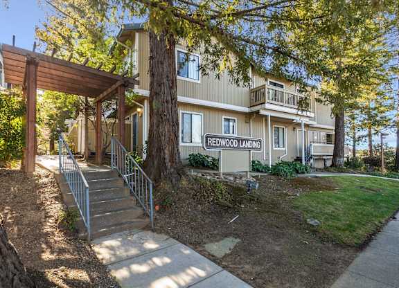 exterior of apartment building with Redwood Landing sign at Redwood Landing Apartments, California, 94947
