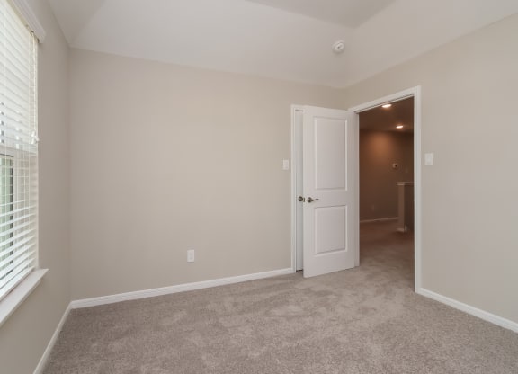 Carpeted Bedroom at Pradera Oaks in Bonney, Texas