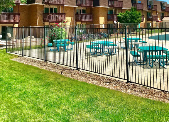 a building with a fence in front of it
