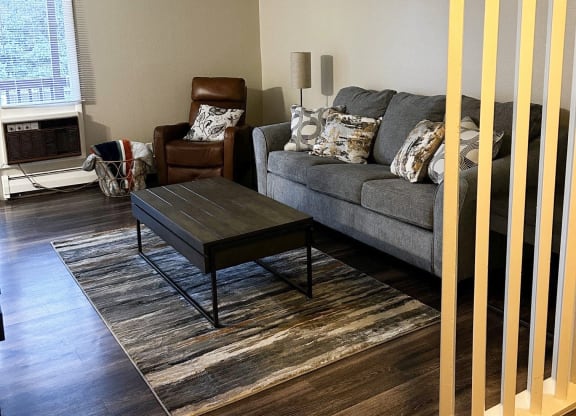 a living room with a couch and a coffee table