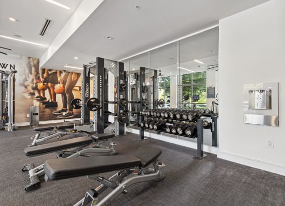 the gym at the enclave at woodbridge apartments in sugar land, tx