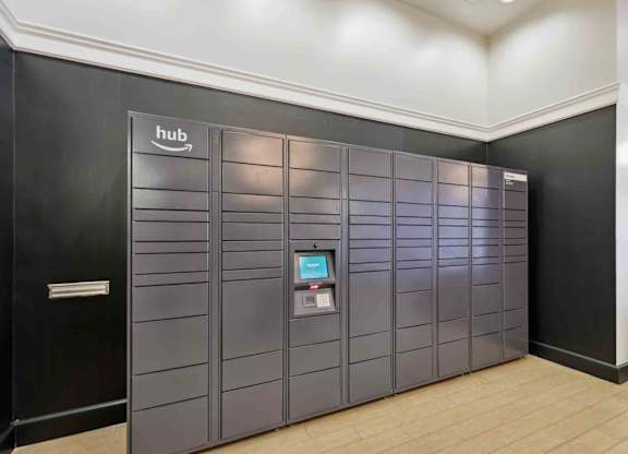 a large number of lockers in a room with a wood floor