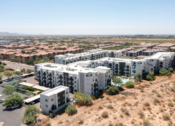 an aerial view of slate scottsdale large apartment complex in the middle of a desert