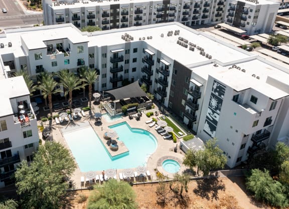 a view of the courtyard and pool at slate apartments in arizona