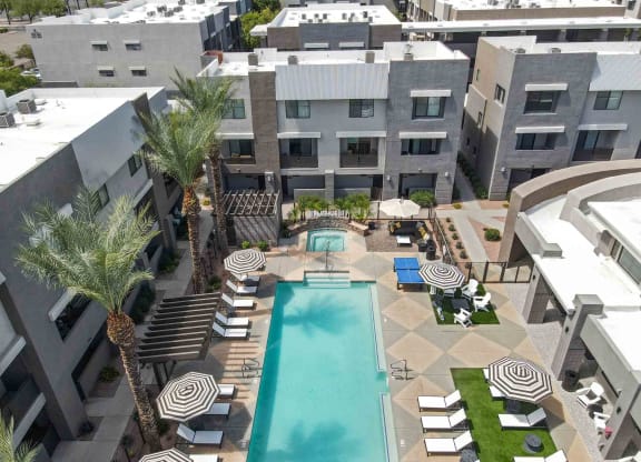 an aerial view of the resort style pool and courtyard