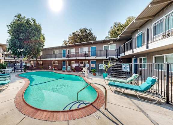 A sunny day at the pool of a residential complex at Pennsylvania Place, Davis, California