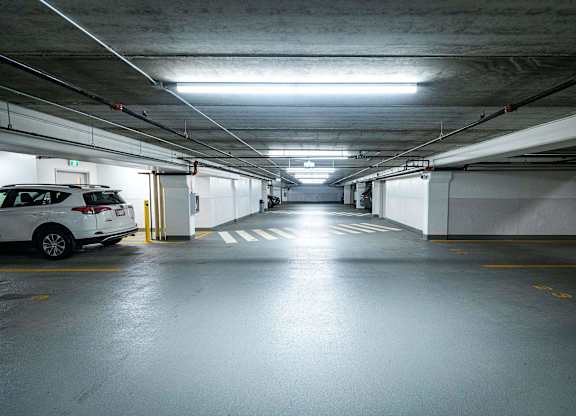a parking garage with a car in it