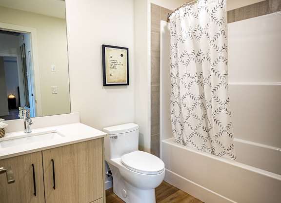 a bathroom with a toilet and a sink