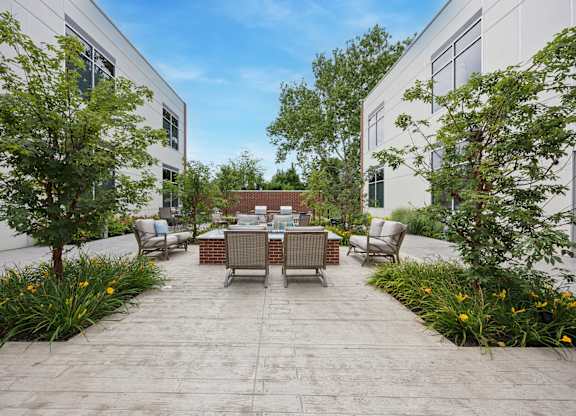 Patio with Table surrounded by chairs at Heritage Court, Ewing, New Jersey, 08628