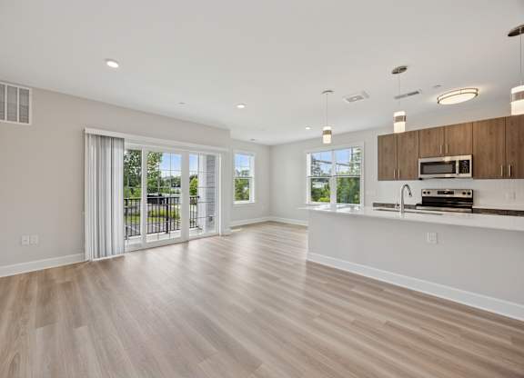 Kitchen with Cabinetry and Room with glass sliding doors at Heritage Court, Ewing