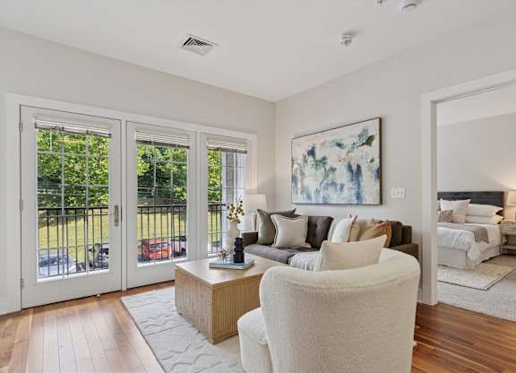 Room with couch and glass door at Palmer View, Palmer Township, 18045