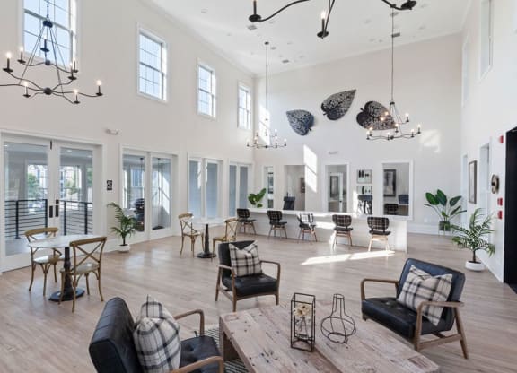 a large room with lots of furniture and chandeliers  at Harper's Crossing, Langhorne, Pennsylvania