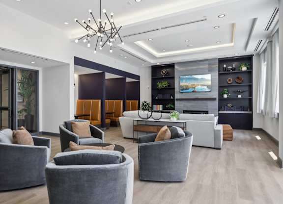 Lounge area with comfortable seating at Heritage Court, New Jersey, 08628