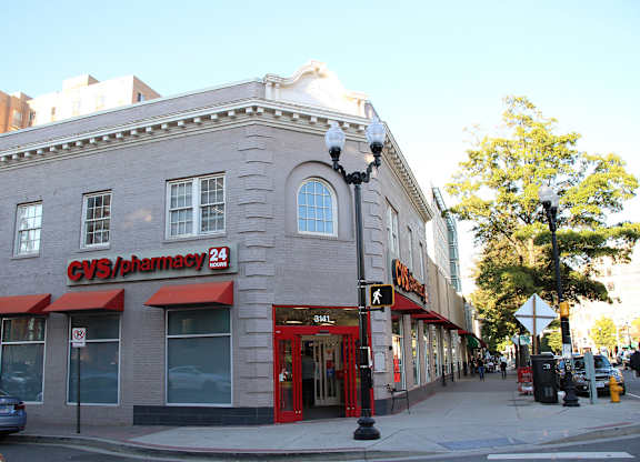 A CVS Pharmacy is located on the corner of a street.