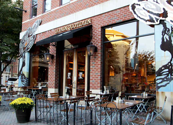 A restaurant named Le Panouffrient has tables and chairs outside.